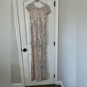 Beautiful floor length sequin gown by Windsor.
